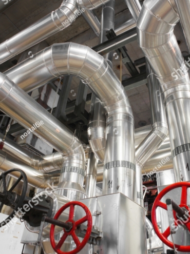 stock-photo-equipment-cables-and-piping-as-found-inside-of-a-modern-industrial-power-plant-613785950