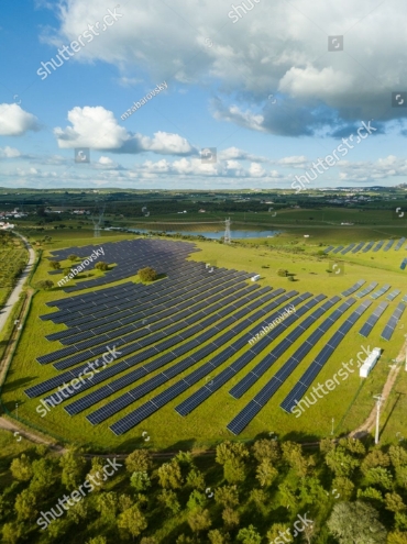 stock-photo-photovoltaic-solar-panels-on-sunny-day-in-portugal-aerial-view-2626604817