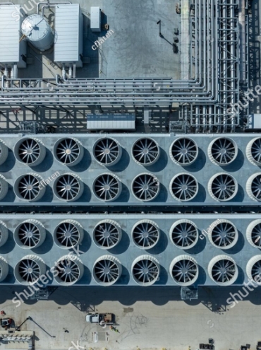 stock-photo-top-down-aerial-of-an-ai-data-center-with-extensive-cooling-fans-piping-and-infrastructure-2766228069
